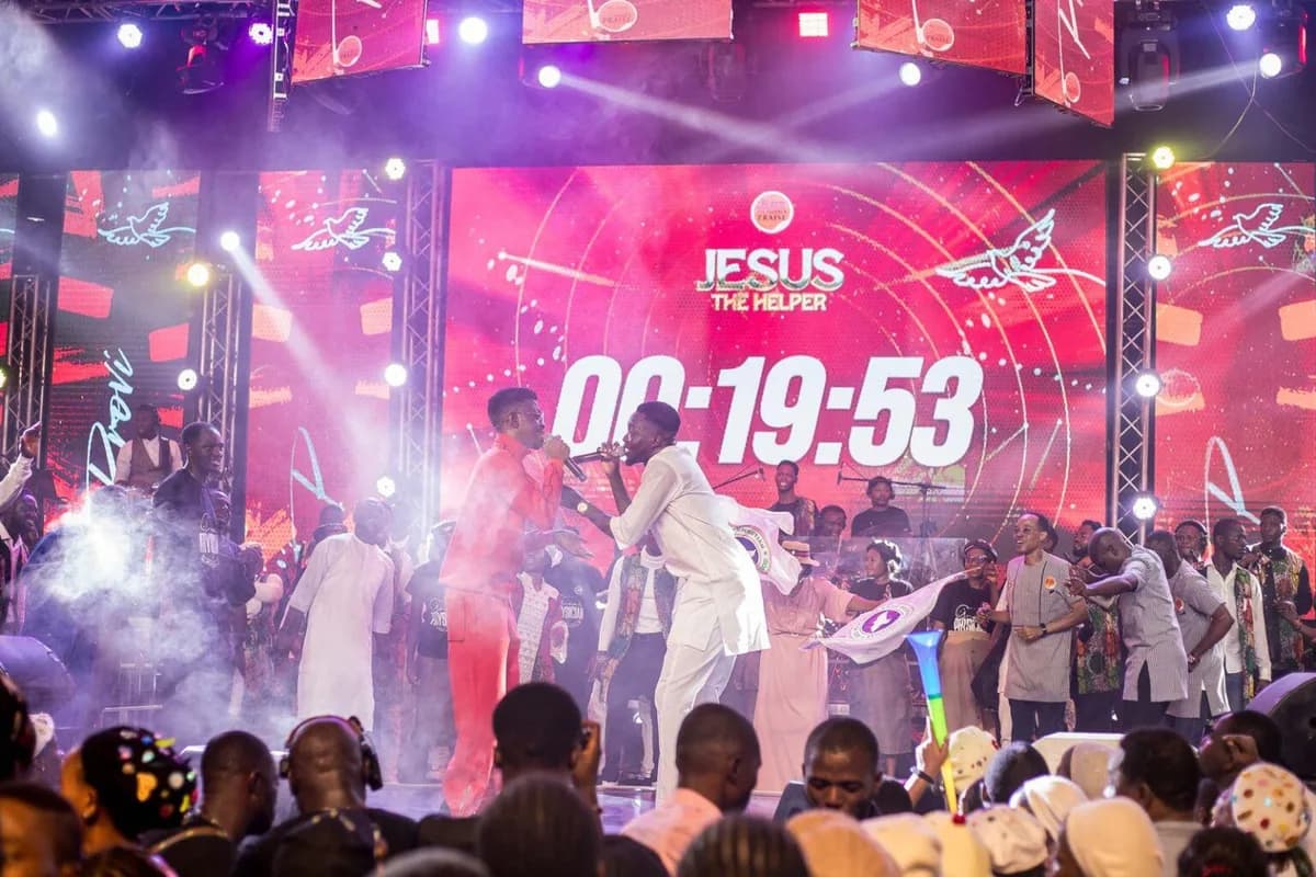 Worshippers with hands raised during Marathon Messiah’s Praise